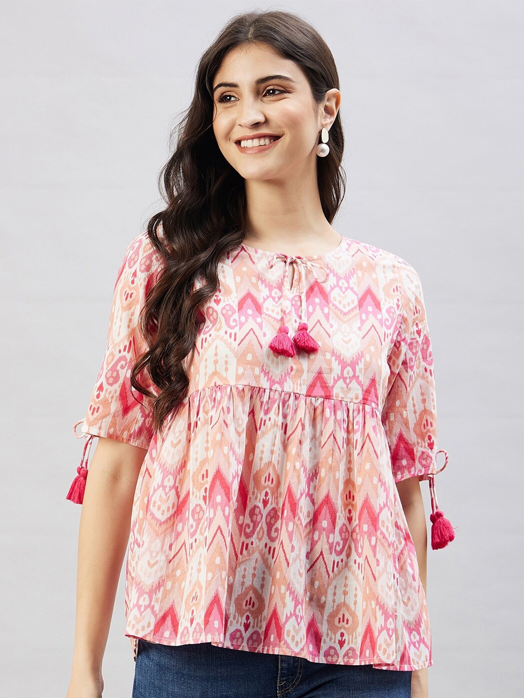 

WineRed Ethnic Motifs Printed Tie-Up Neck Pure Cotton Peplum Top, Pink