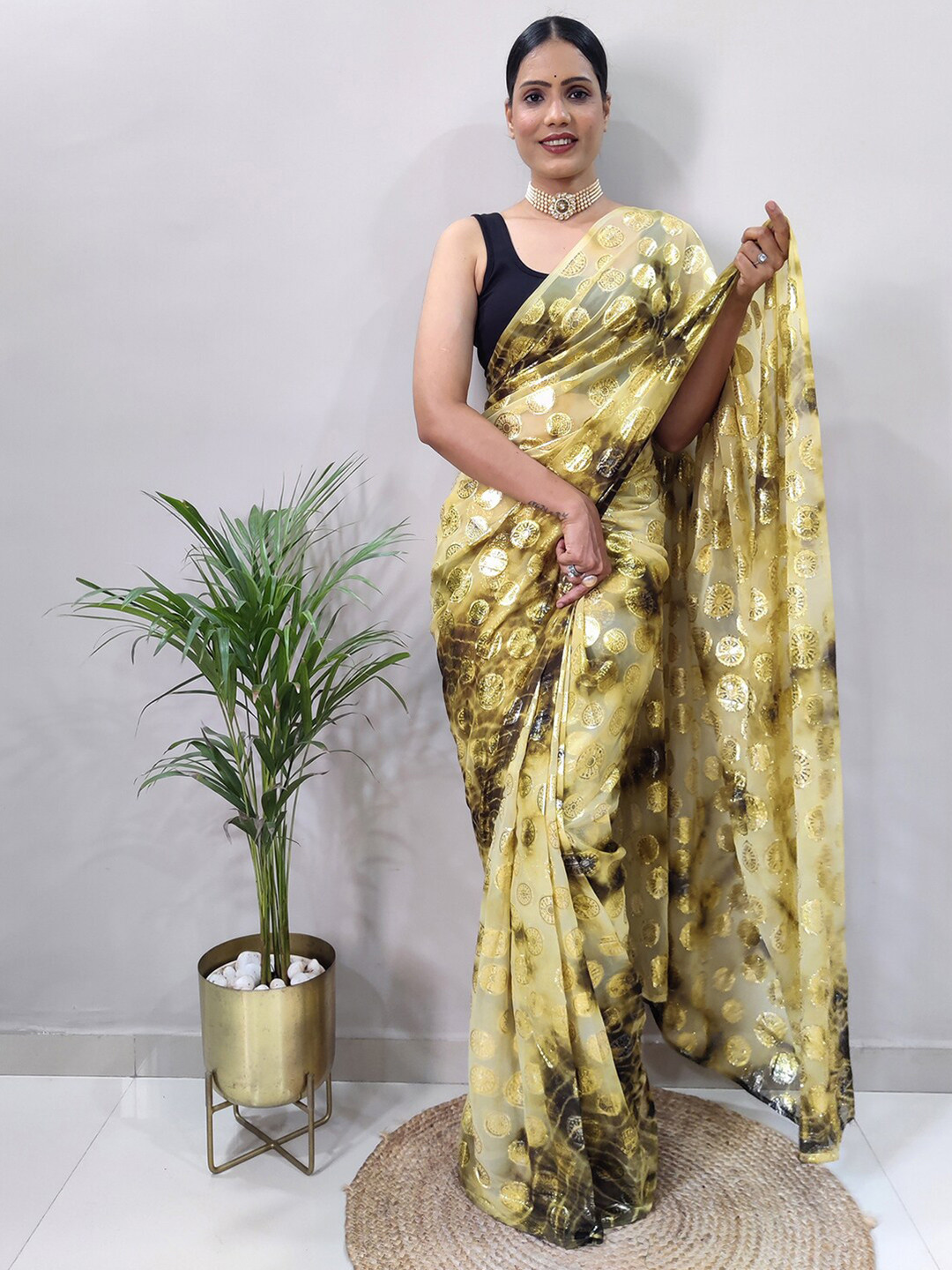 

Mitera Yellow & Gold-Toned Polka Dot Printed Saree