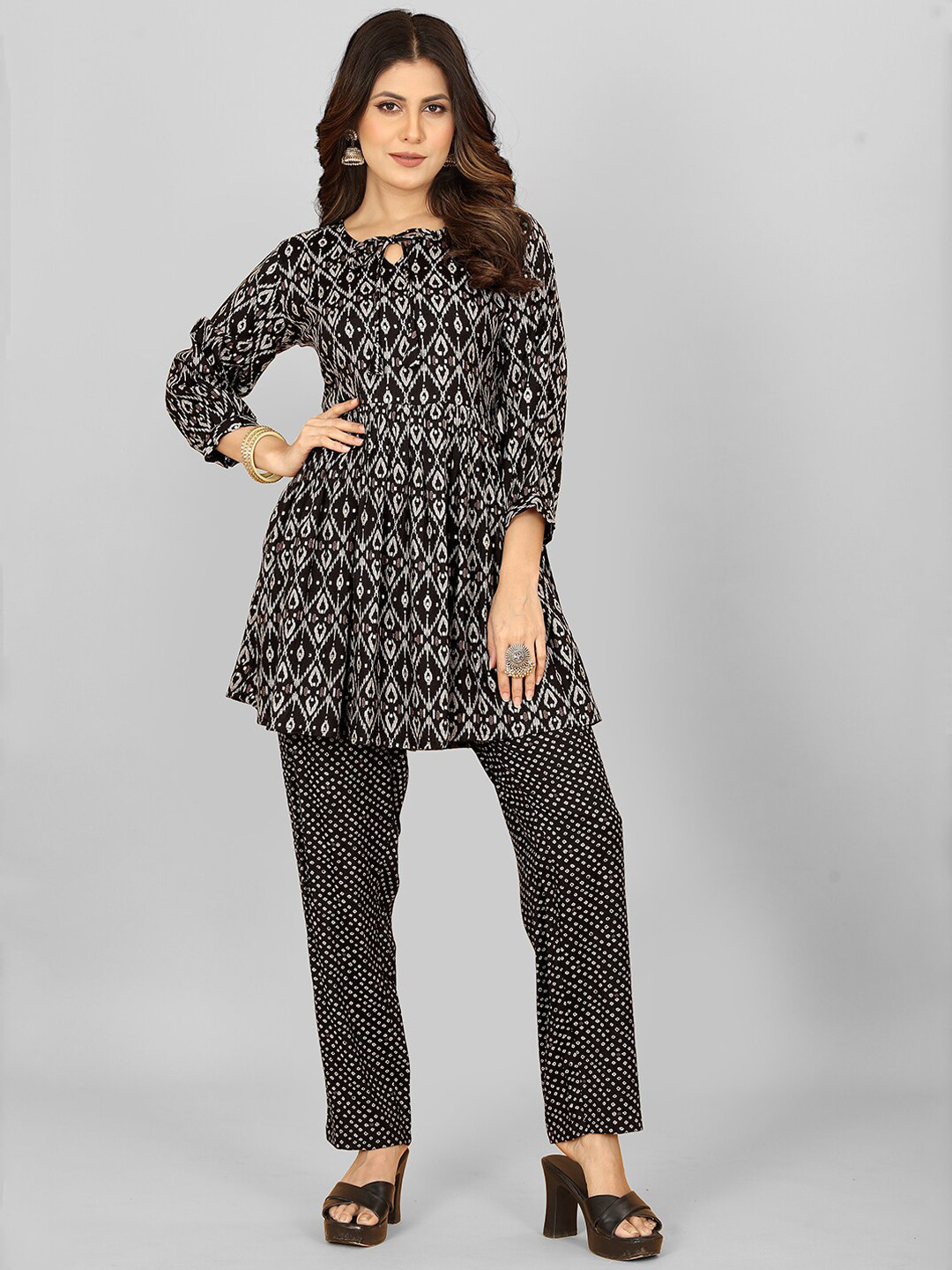 

Lilots Ethnic Motifs Printed Tie-Up Neck Kurti With Trouser, Black