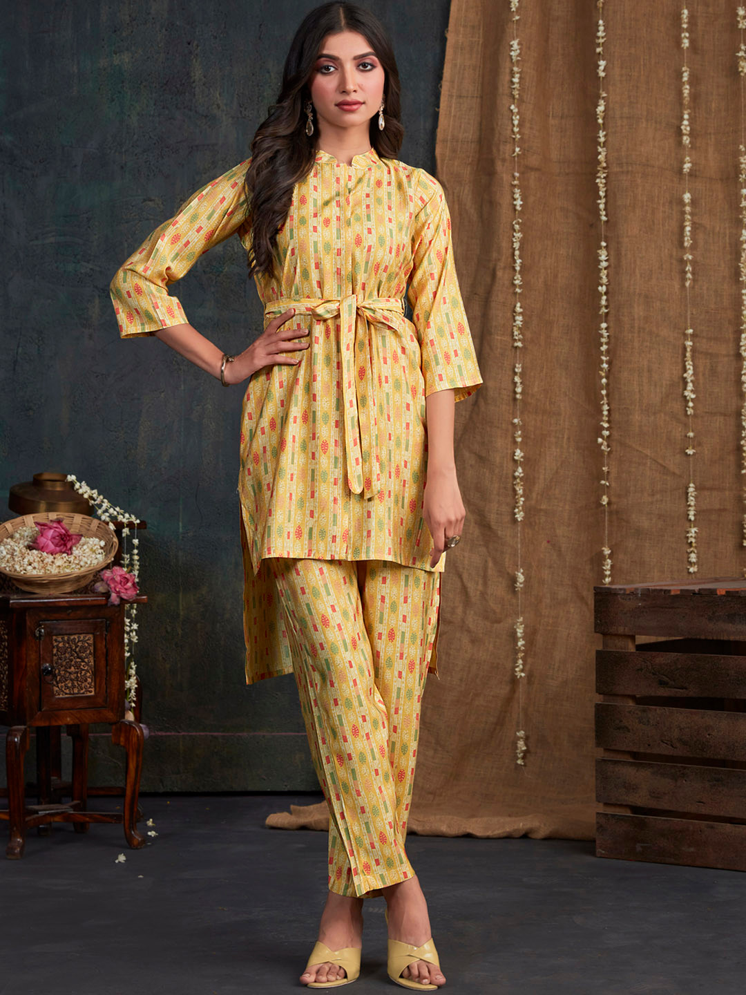 

Sangria Yelloe & Red Printed Ethnic Motifs Printed Kurti With Trousers, Yellow