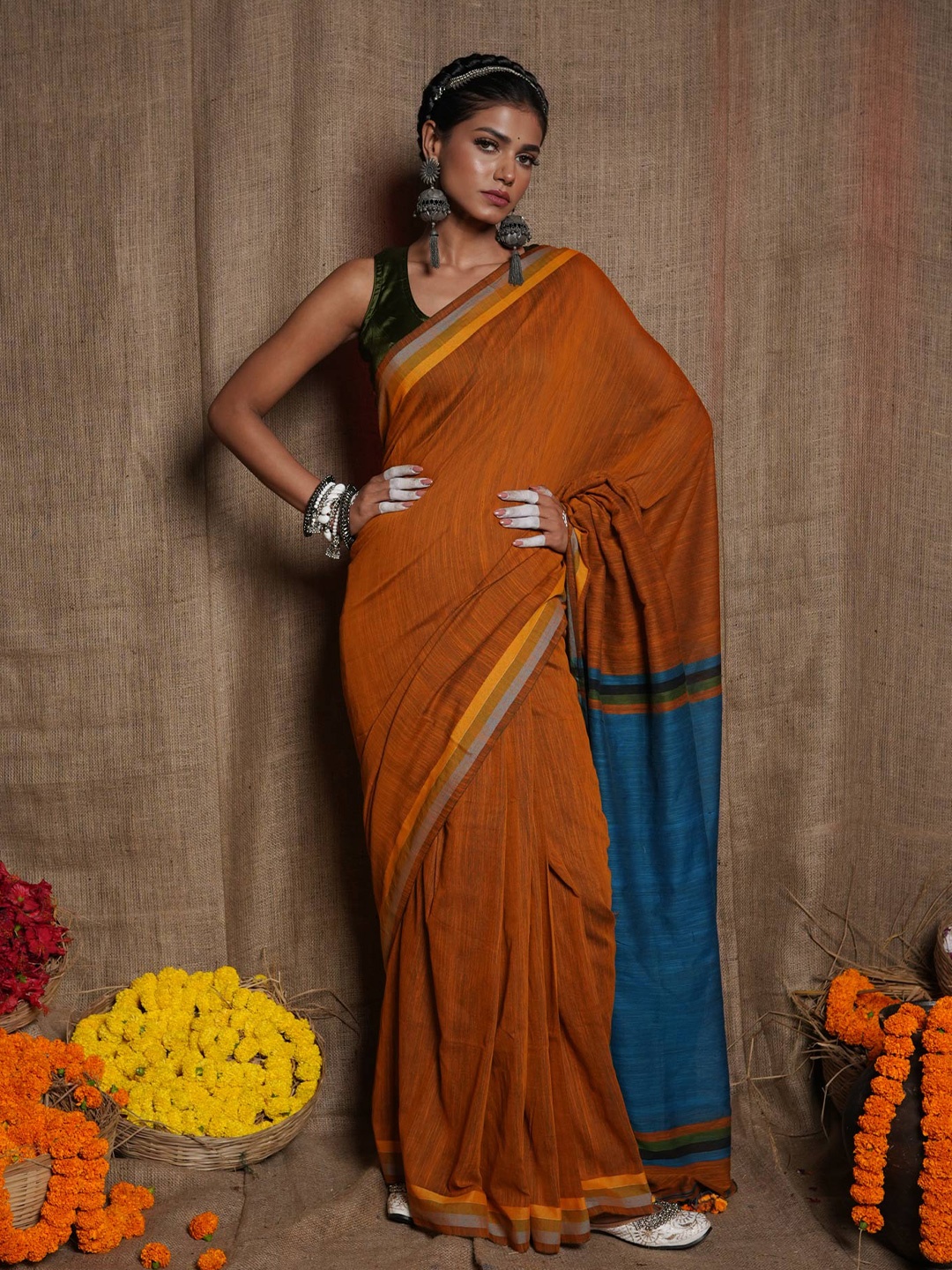 

Unnati Silks Woven Design Pure Cotton Jamdani Saree, Orange