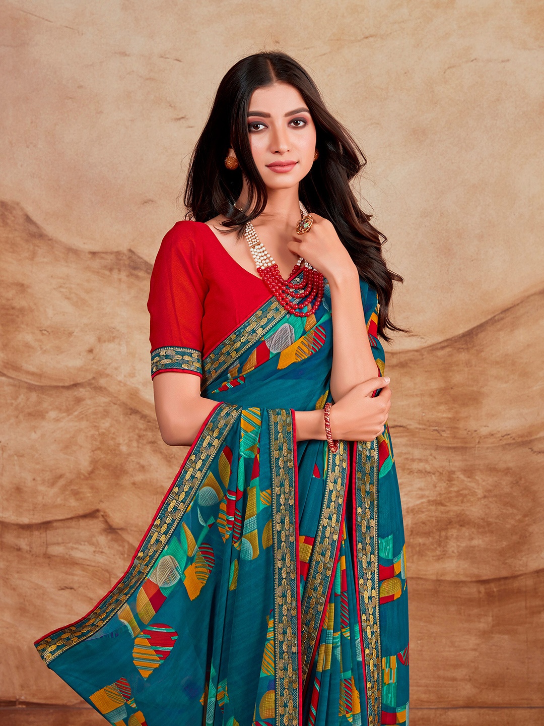 

Sangria Blue & Red Abstract Printed Saree