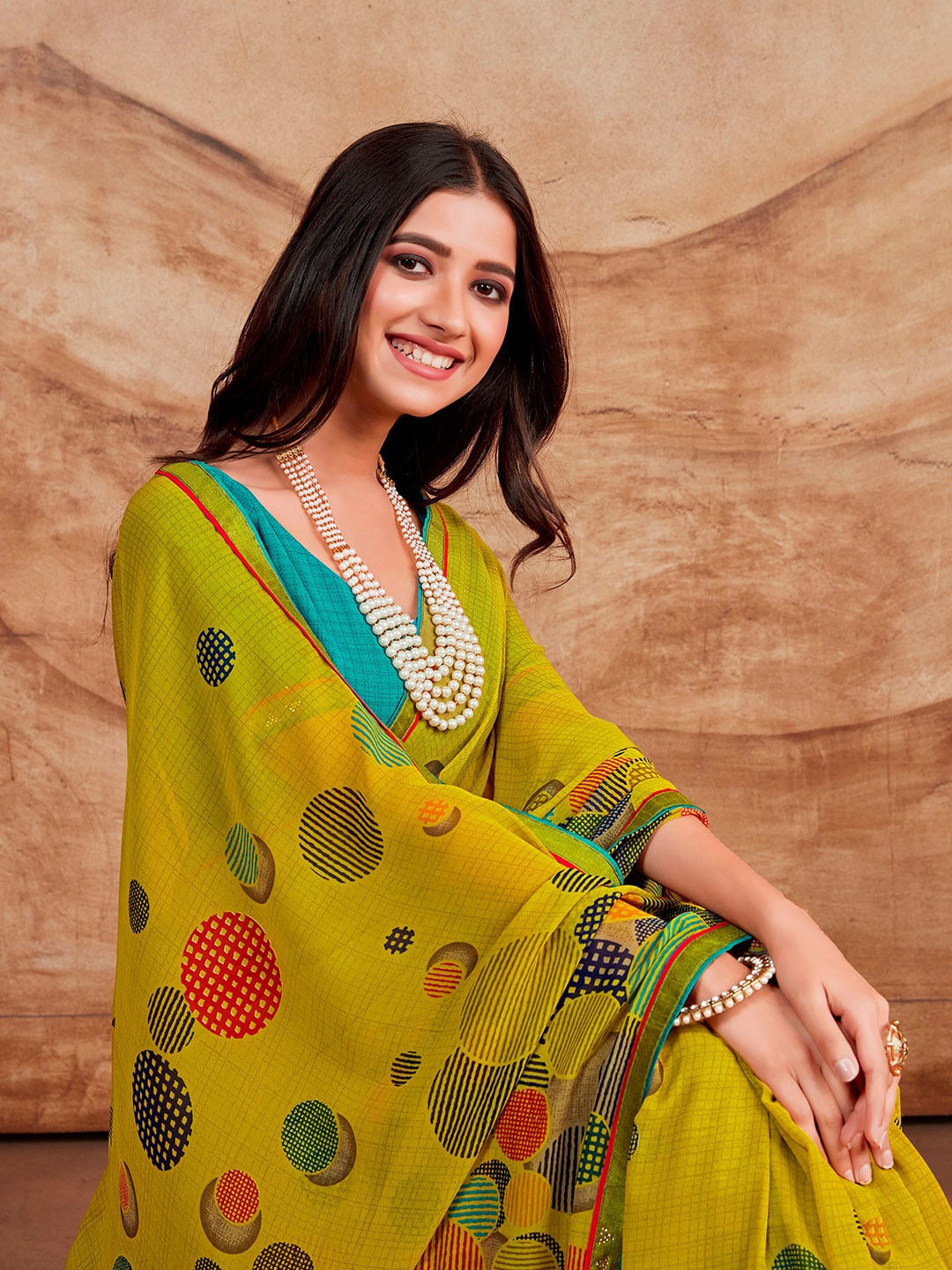 

Sangria Yellow & Blue Geometric Printed saree