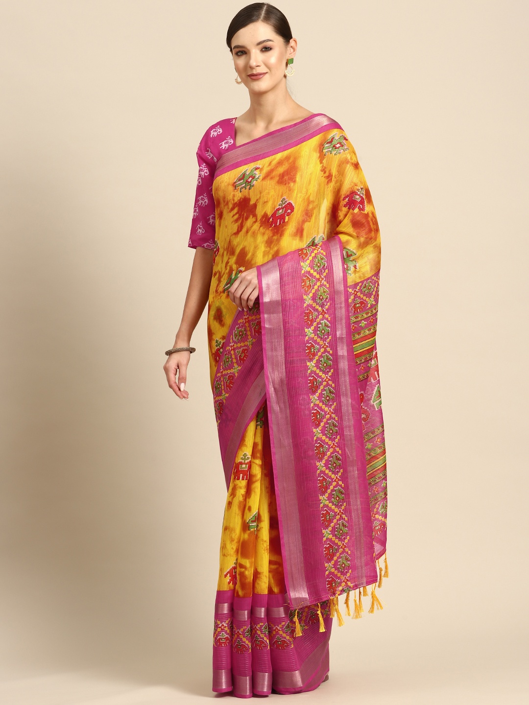 

Mizzific Ethnic Motifs Patola Saree, Yellow
