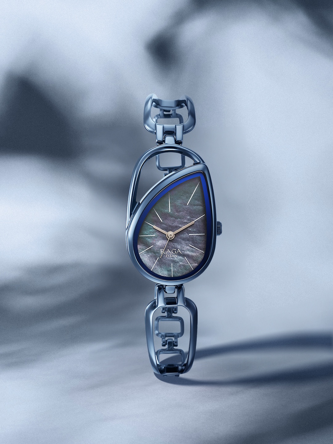

Titan Women Printed Dial & Stainless Steel Bracelet Style Straps Analogue Watch 2688QM02, Blue
