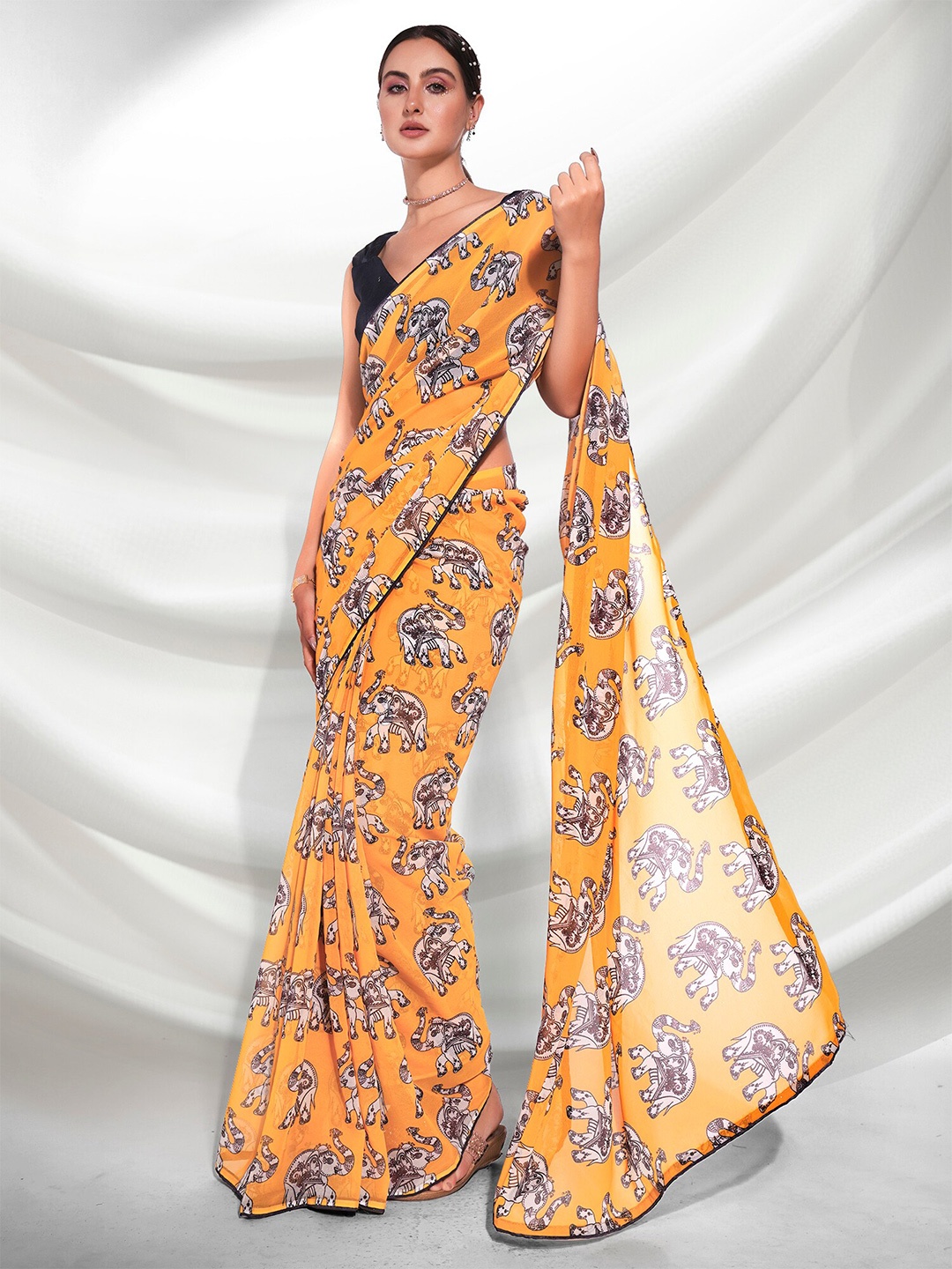 

Mitera Ethnic Motifs Printed Saree, Yellow