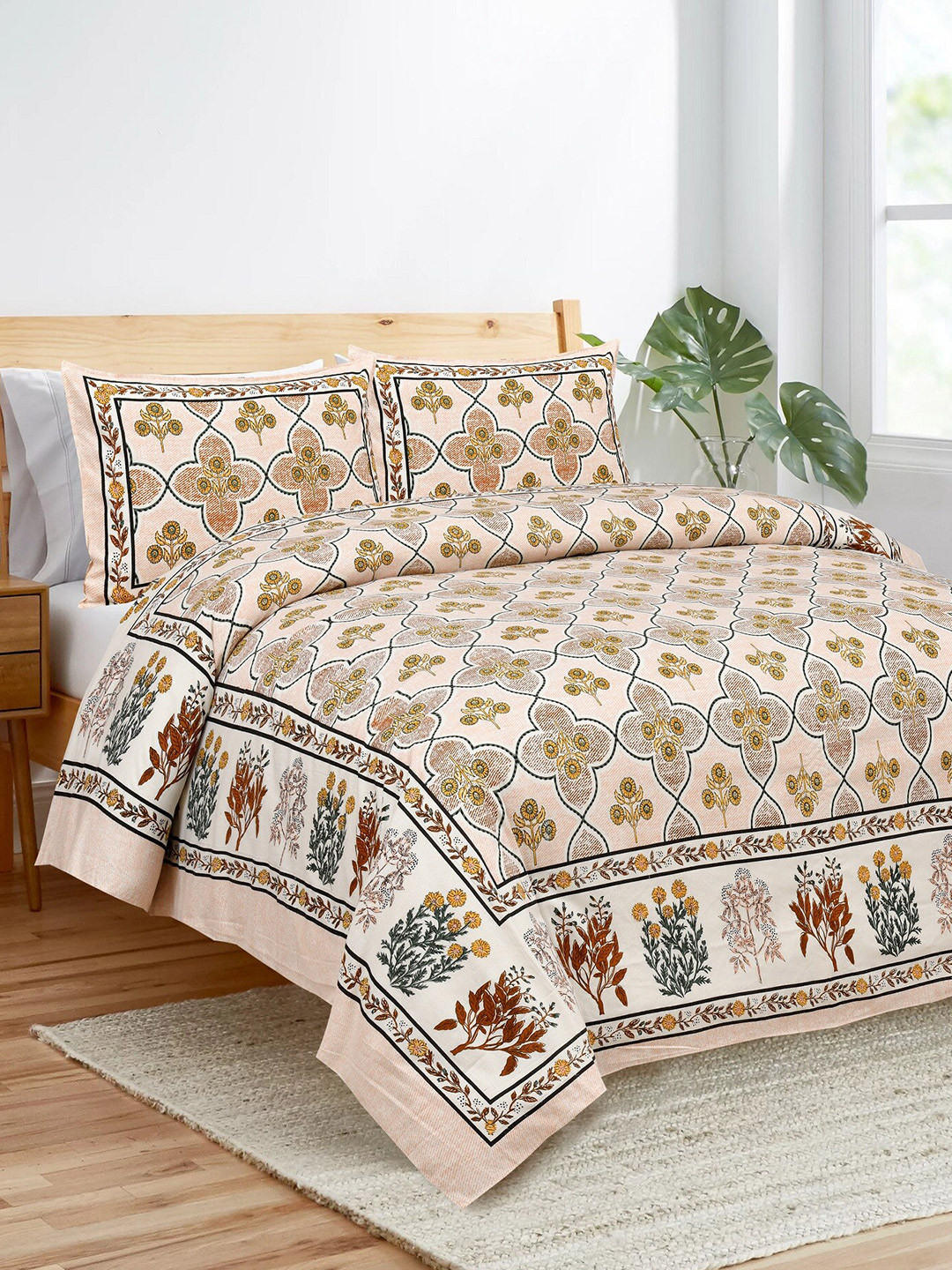 

Stylespace by Isha Green & White Floral Cotton 250 TC King Bedsheet With 2 Pillow Covers