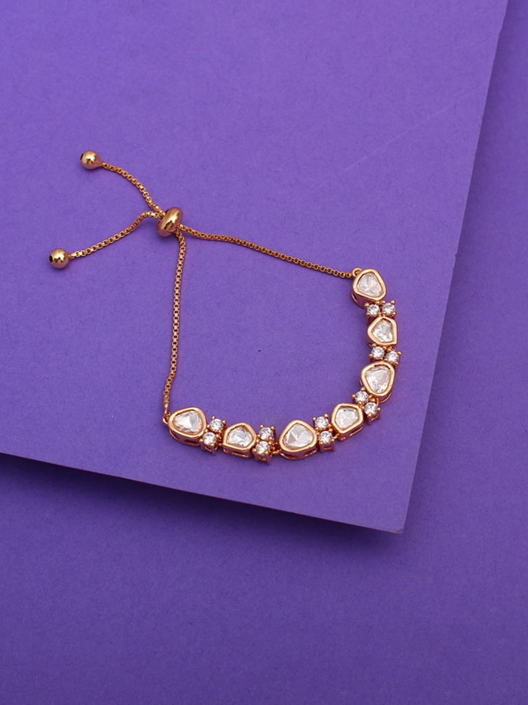 

Mirana American Diamond Gold-Plated Charm Bracelet