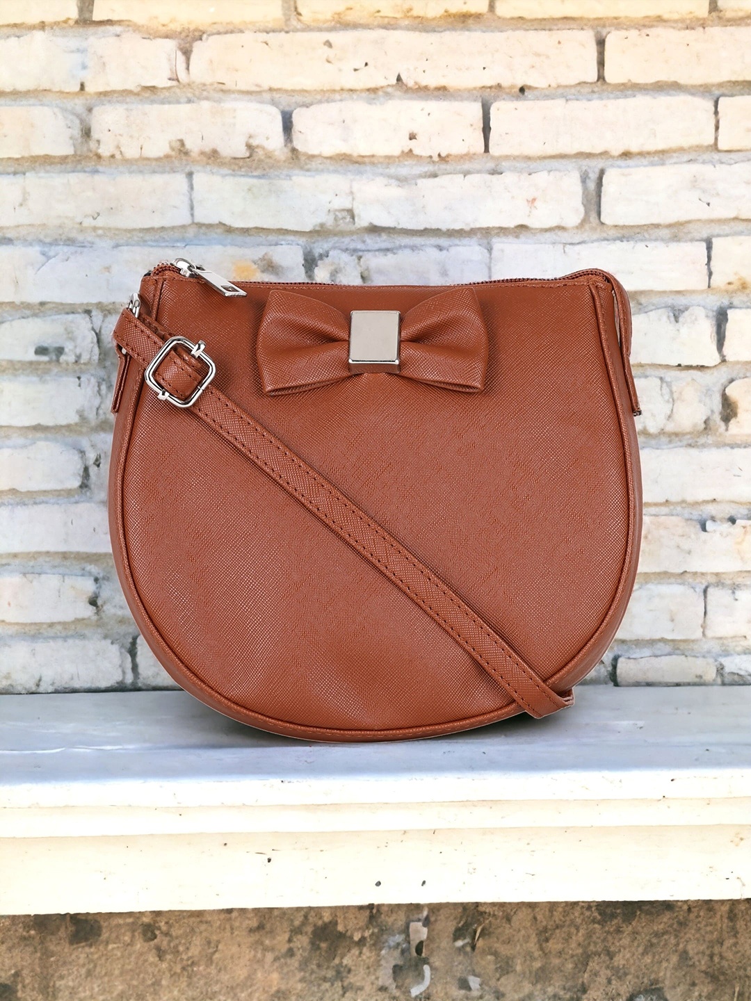 Toteteca Structured Sling Bag With Bow Detail, Tan