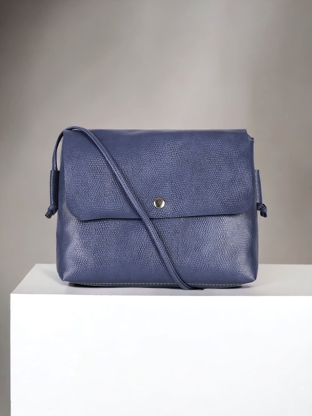 

Toteteca Structured PU Sling Bag, Blue