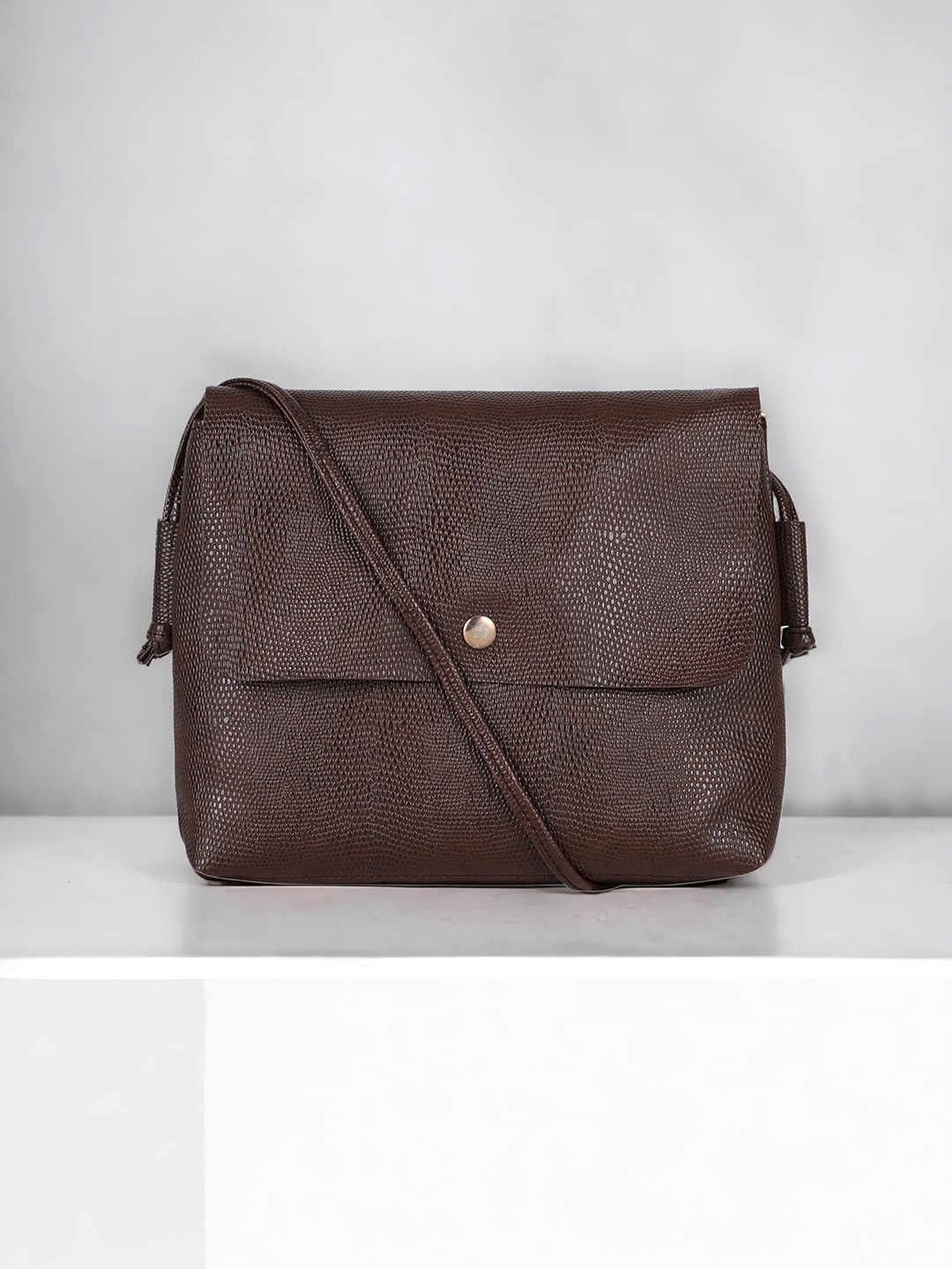 

Toteteca Textured Structured Sling Bag, Brown