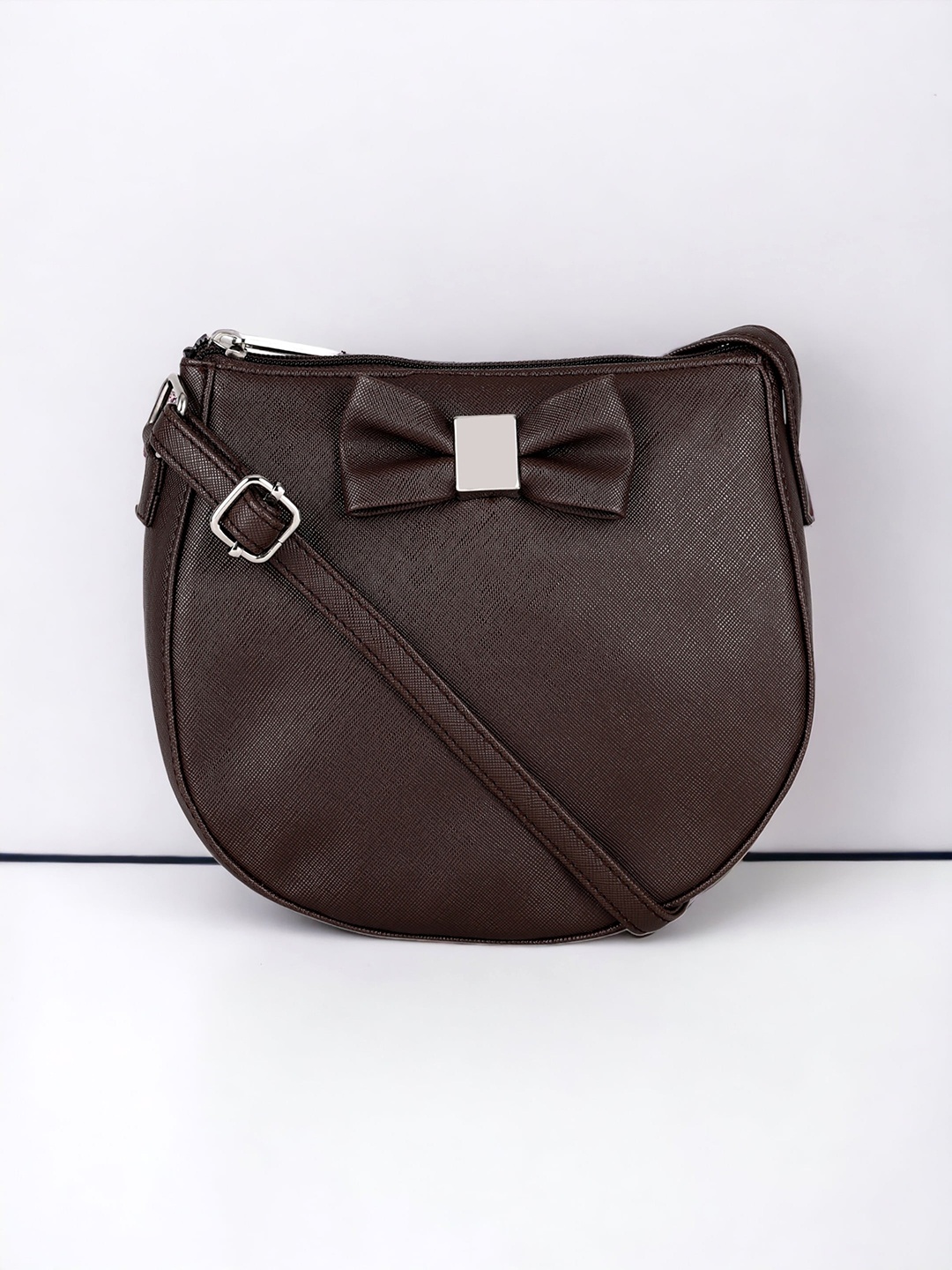 

Toteteca Textured Sling Bag with Bow Detail, Brown