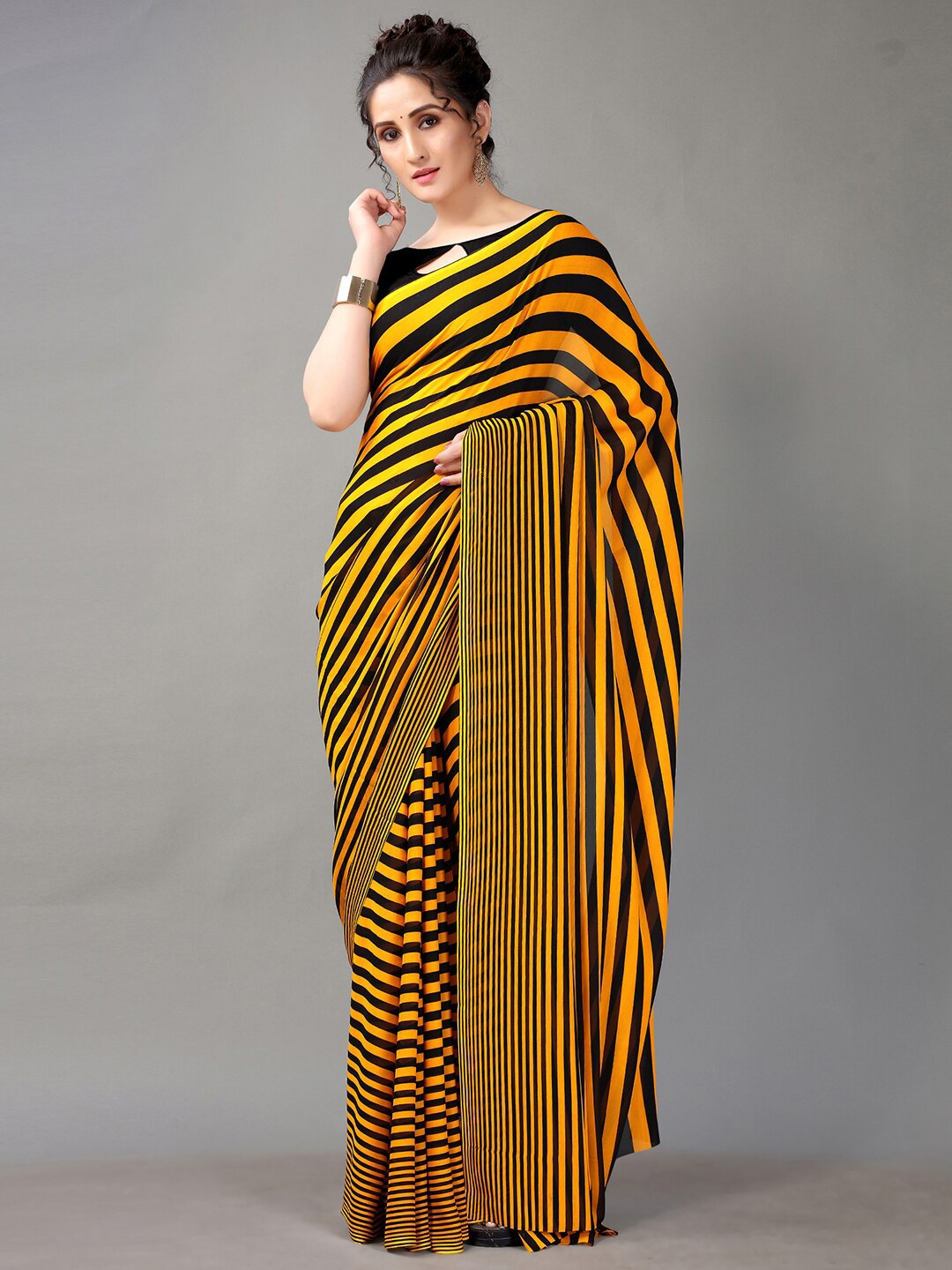 

KALINI Striped Poly Georgette Saree, Yellow