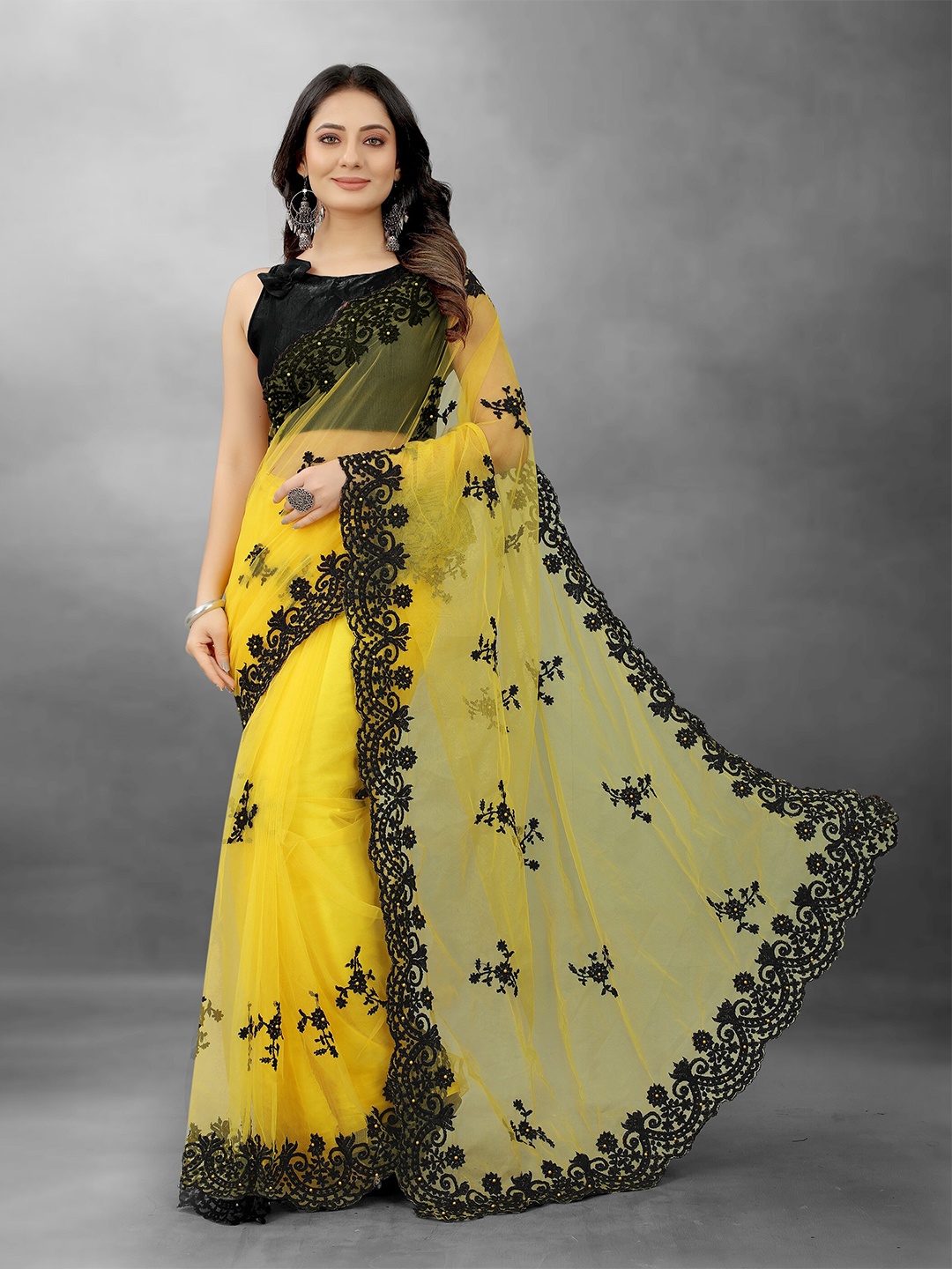 

BARKIYA CREATION Floral Embroidered Beads And Stones Net Saree, Yellow