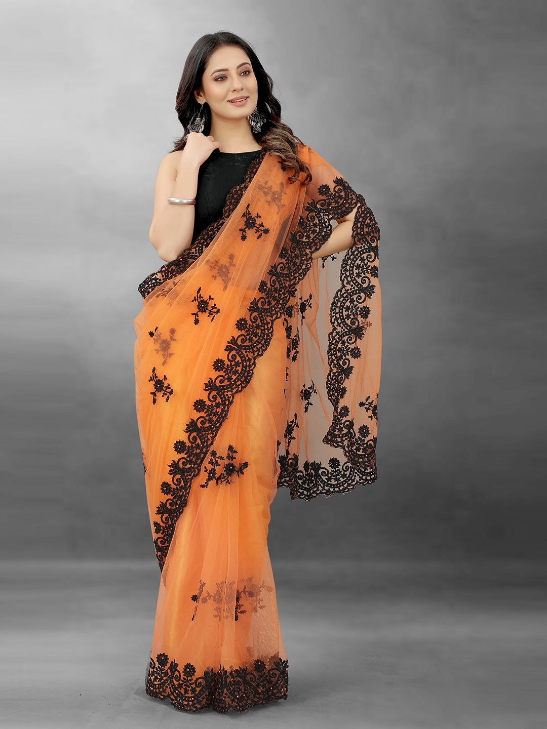 

BARKIYA CREATION Floral Embroidered Beads And Stones Net Saree, Orange