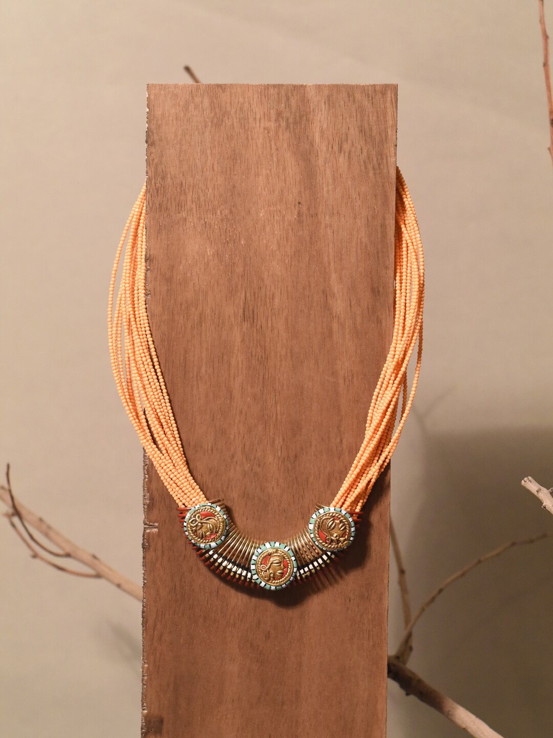 

AAKRITI ART CREATIONS Unisex Folkloric Sunburst Pendant Brass-Plated Necklace, Orange