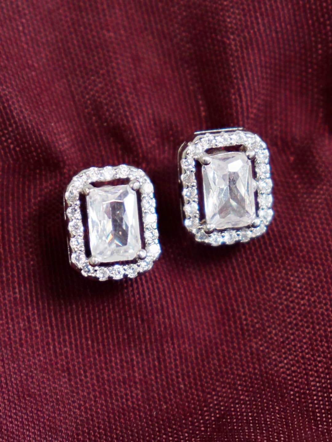 

Zarkan Rhodium-Plated American Diamond-Studded Contemporary Stud Earrings, Silver