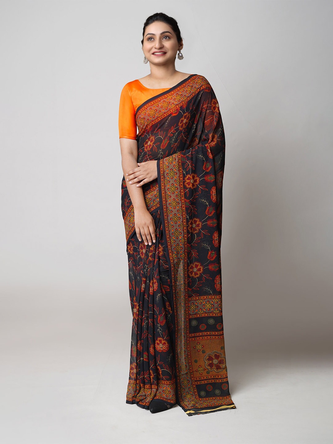 

Unnati Silks Ethnic Motifs Printed Pure Georgette Block Print Saree, Black