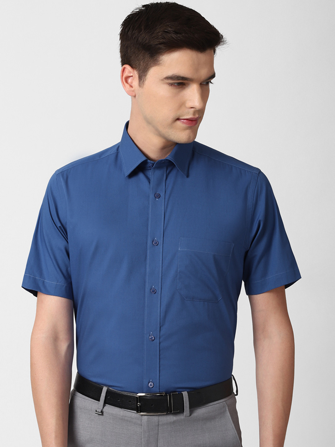 

Peter England Men Blue Slim Fit Solid Formal Shirt