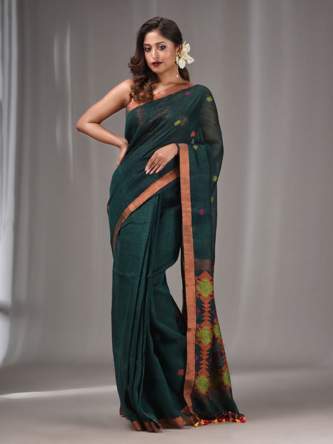 

Charukriti Ethnic Motifs Woven Design Zari Pure Linen Saree, Green