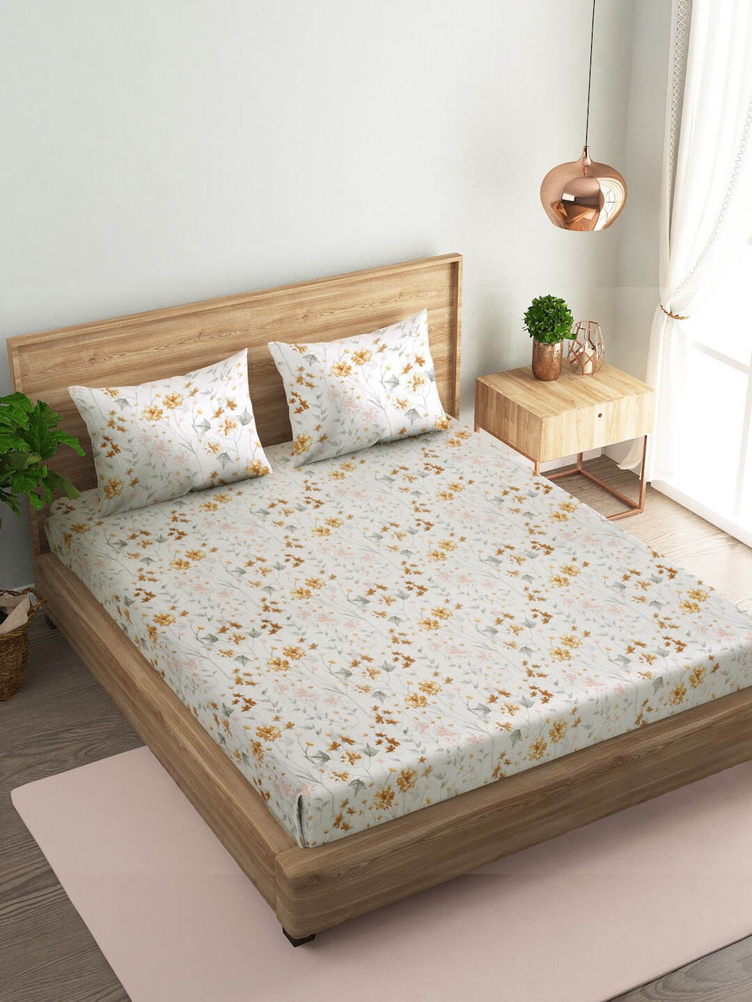 

Naksh White & Yellow Floral Cotton 144 TC Queen Bedsheet With 2 Pillow Covers