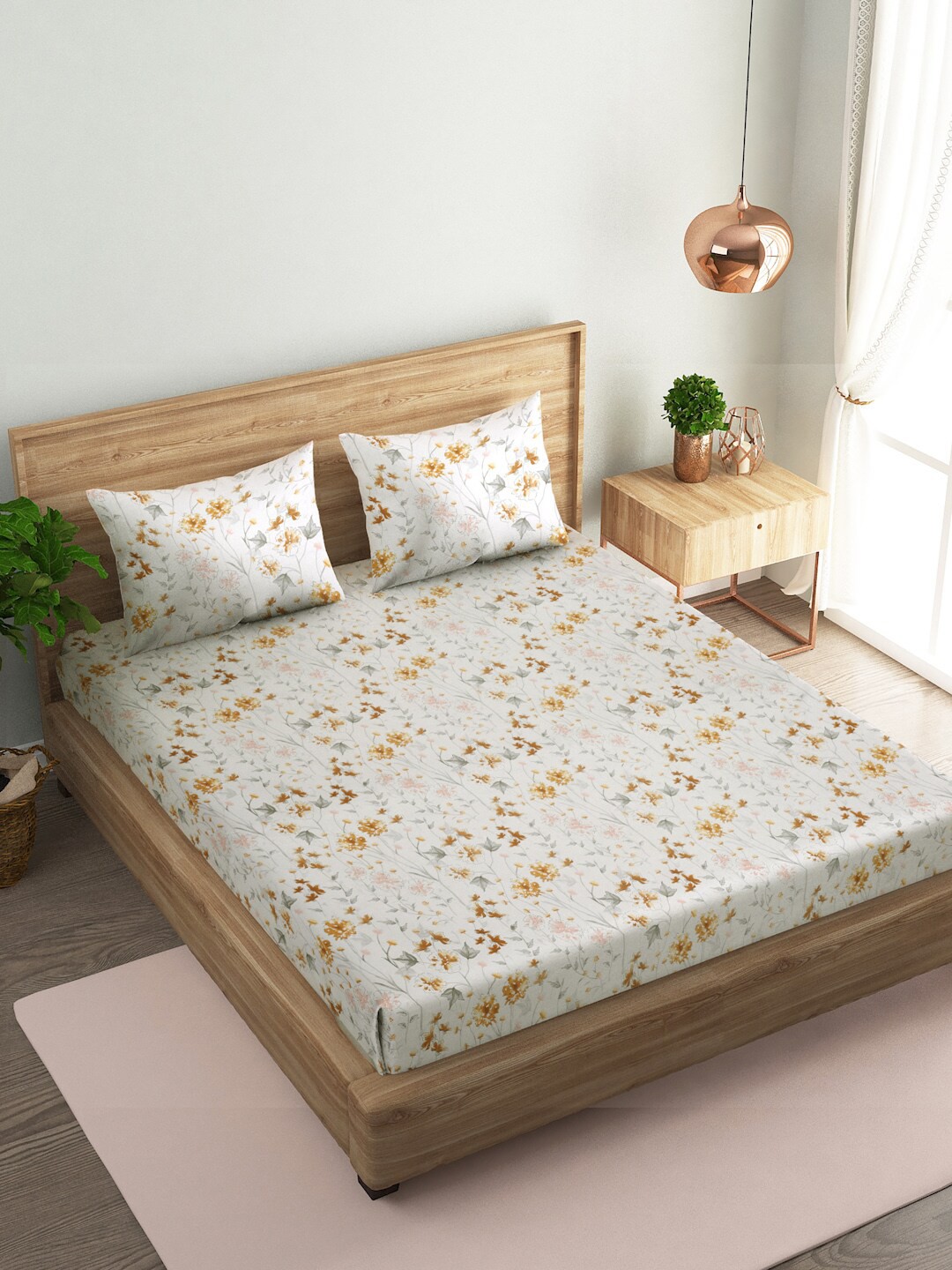 

Naksh White & Yellow Floral Cotton 144 TC King Bedsheet With 2 Pillow Covers