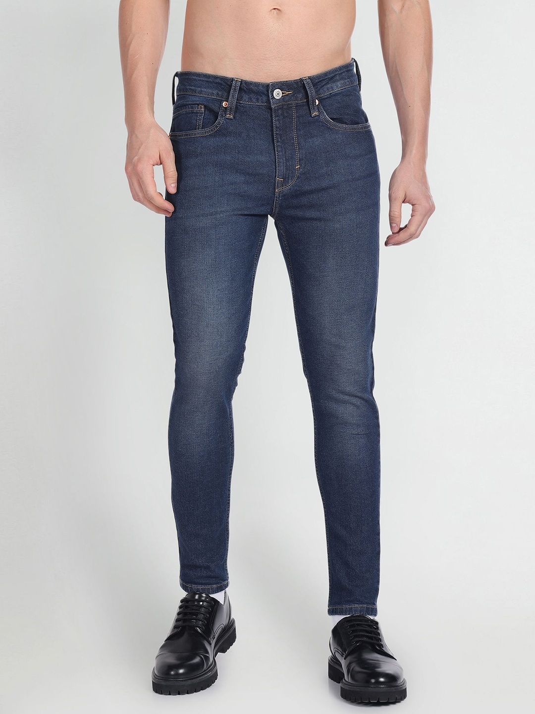 

Flying Machine Men Skinny Fit Mid-Rise Light Fade Cotton Stretchable Jeans, Blue