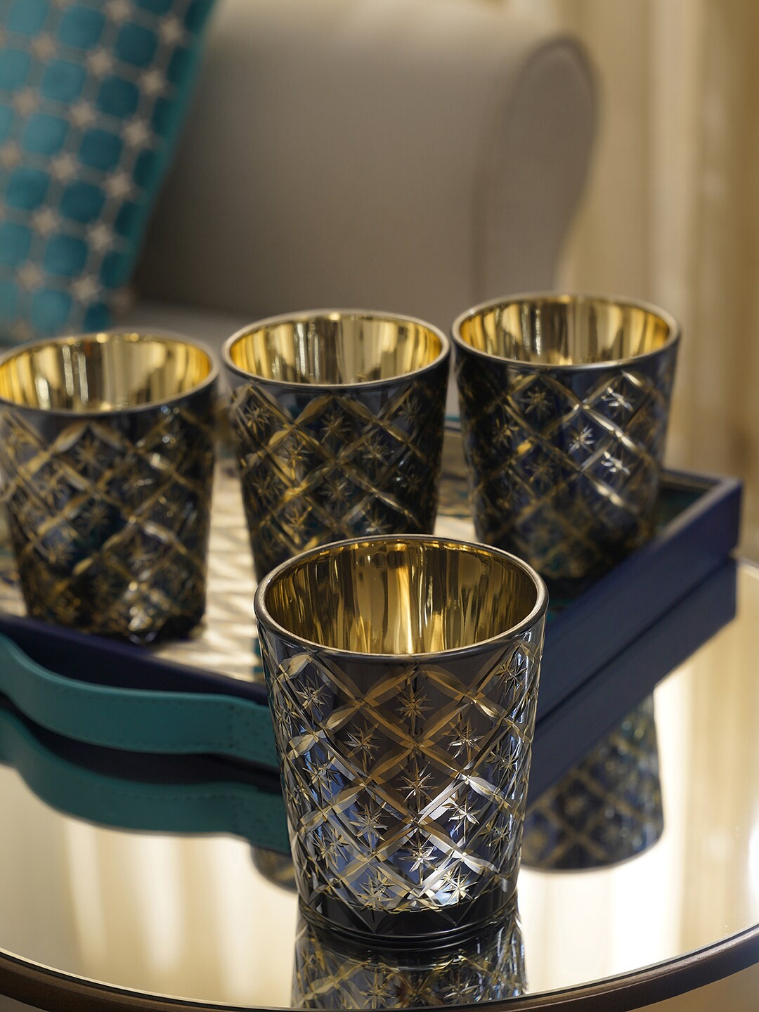 

Pure Home and Living 4-Pcs Blue & Golden Geometric Patterned Candle Holders