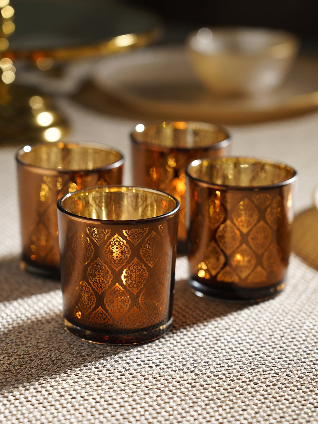 

Pure Home and Living Brown 4 Pieces Cut Patterned Glass Candle Holders