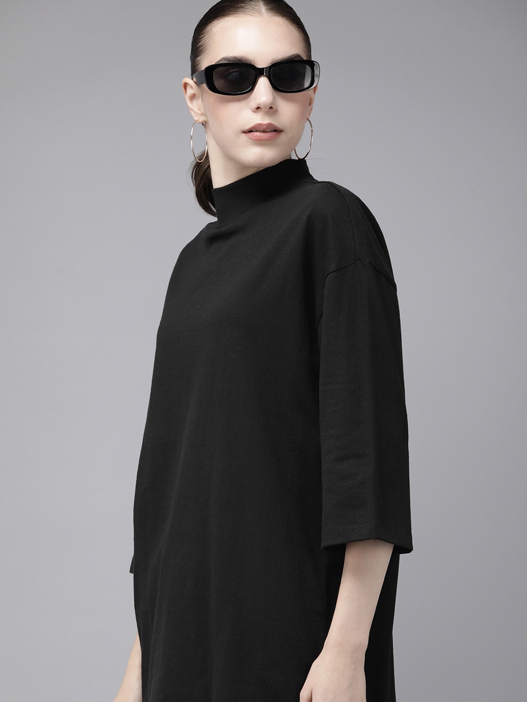 

Roadster Women Solid Oversized High Neck T-shirt, Black