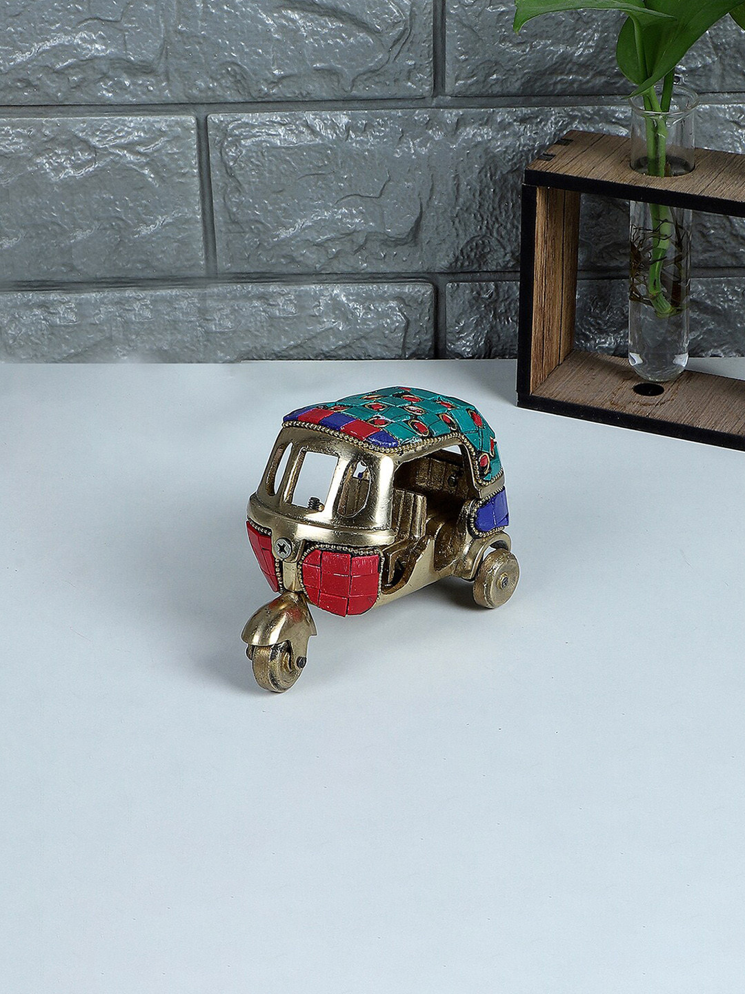 

Two Moustaches Blue & Red Auto Rickshaw Figurine Showpiece