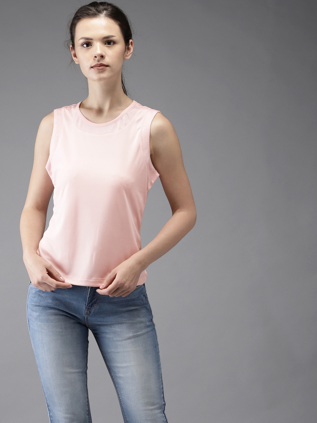 

Flying Machine Women Peach-Coloured Solid Round Neck T-shirt