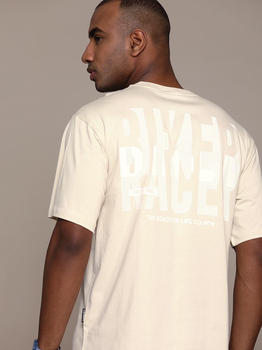 

Roadster The Life Co. Pure Cotton Typography Printed Back Round Neck T-shirt, Beige