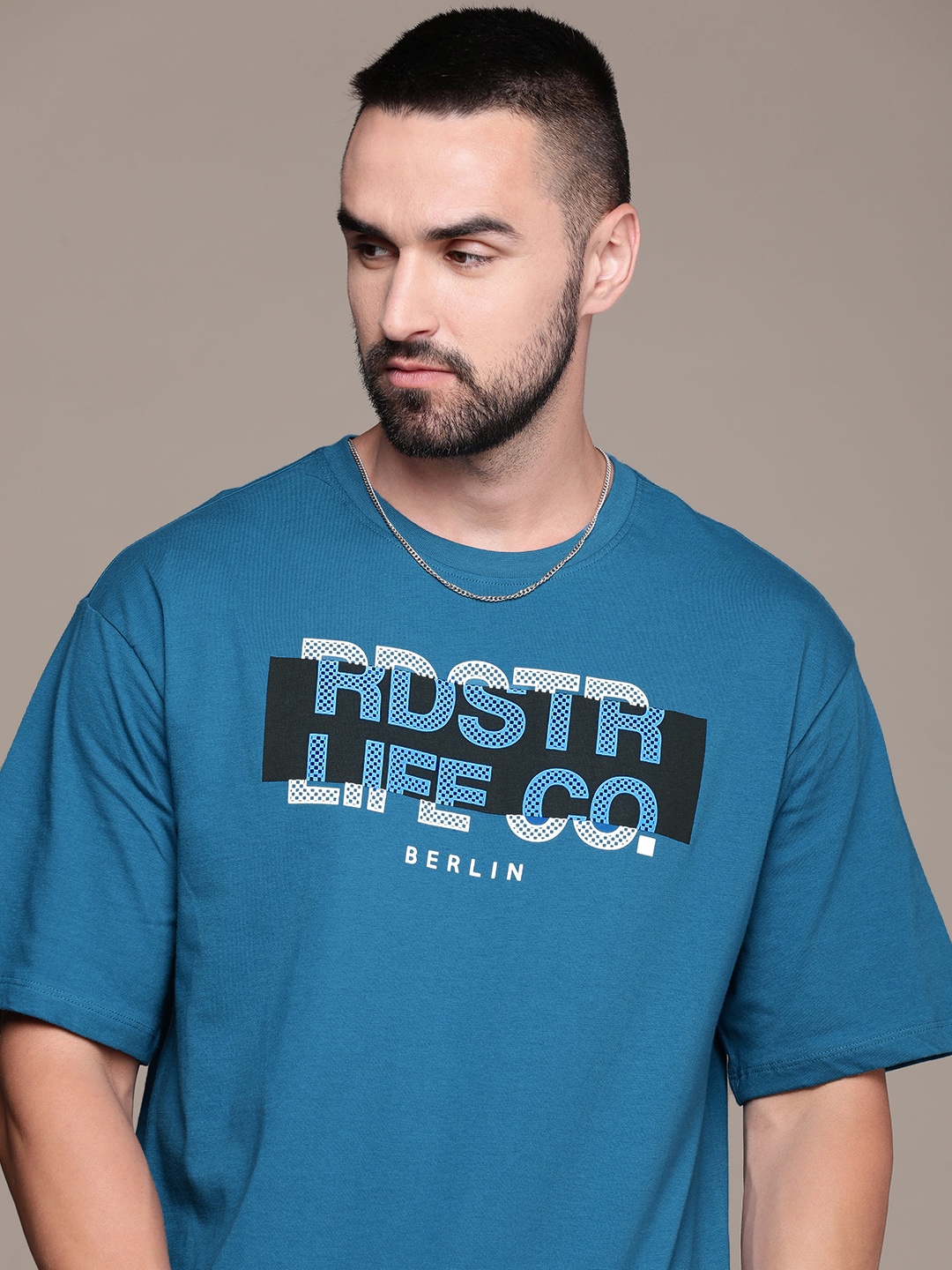 

The Roadster Lifestyle Co. Men Brand Logo Printed Pure Cotton T-shirt, Blue