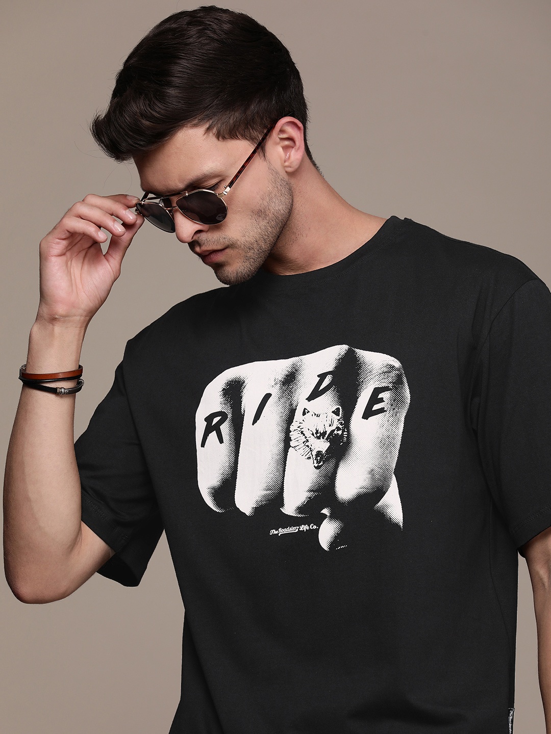 

The Roadster Lifestyle Co. Oversized Fit Pure Cotton Graphic Printed Drop-Shoulder Sleeves Casual T-shirt, Black