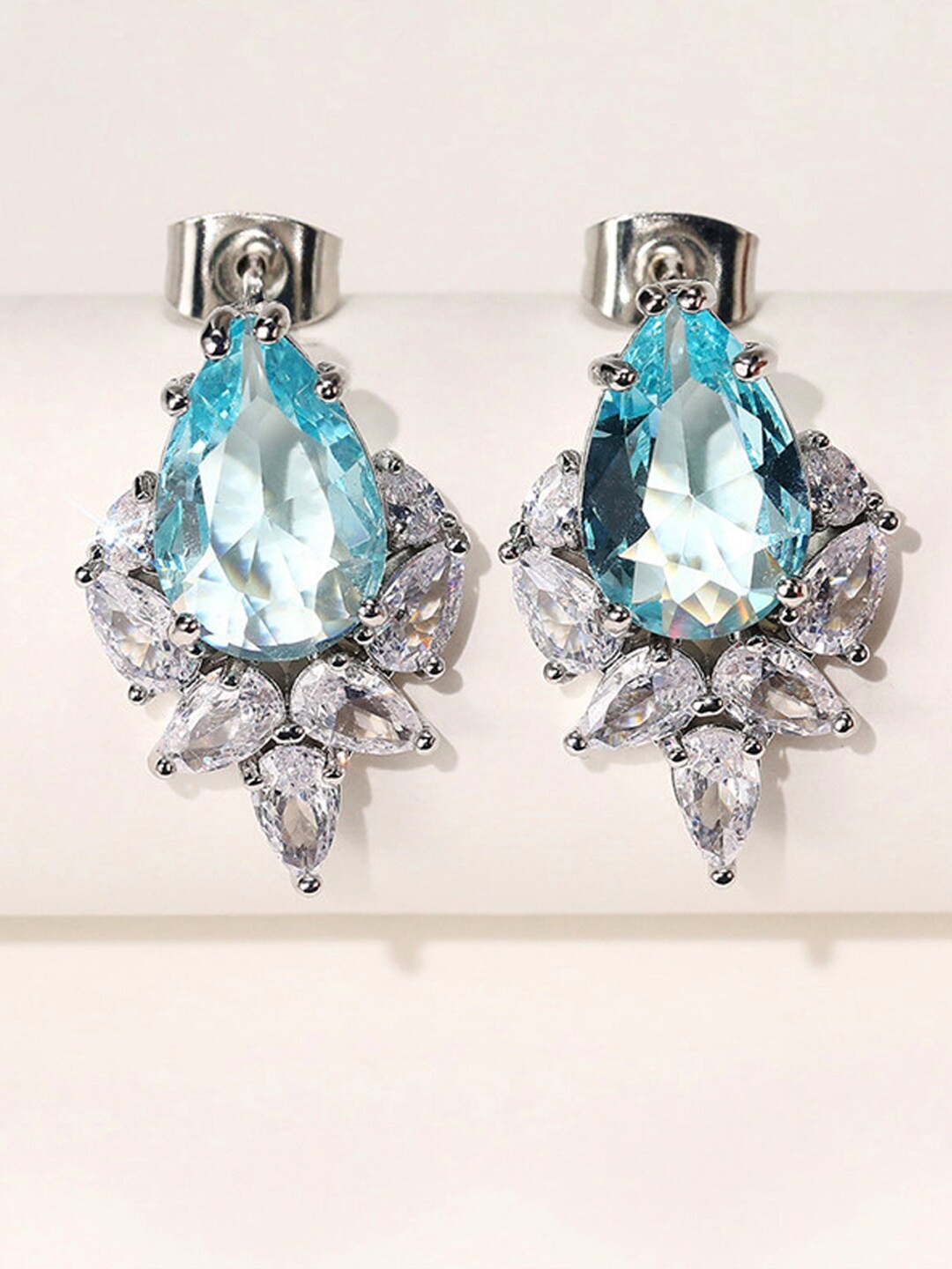 

Designs & You Silver Plated Teardrop Shaped Stud Earrings, Blue