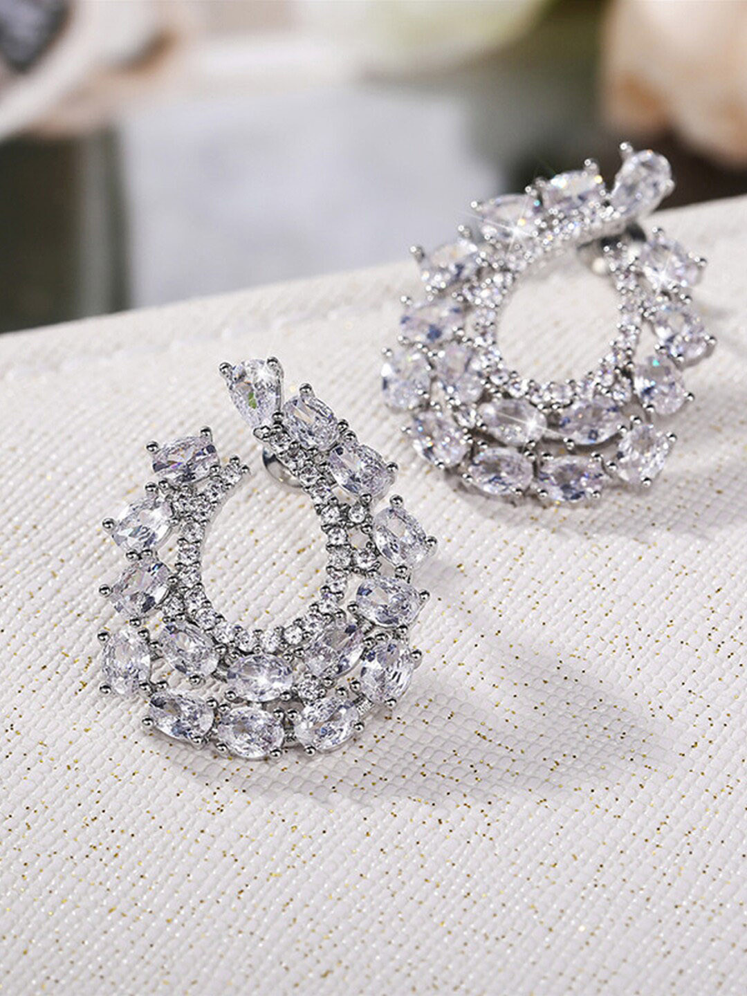 

Designs & You Silver-Plated Contemporary AD Studded Stud Earrings