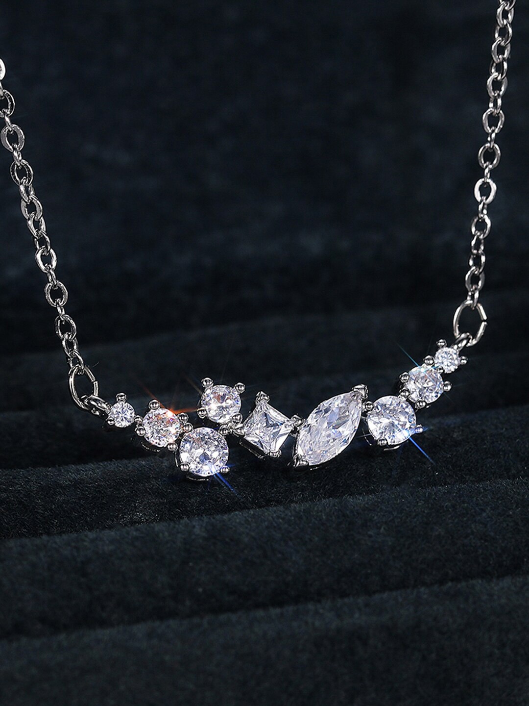 

Designs & You Silver-Plated American Diamond Studded Contemporary Pendent