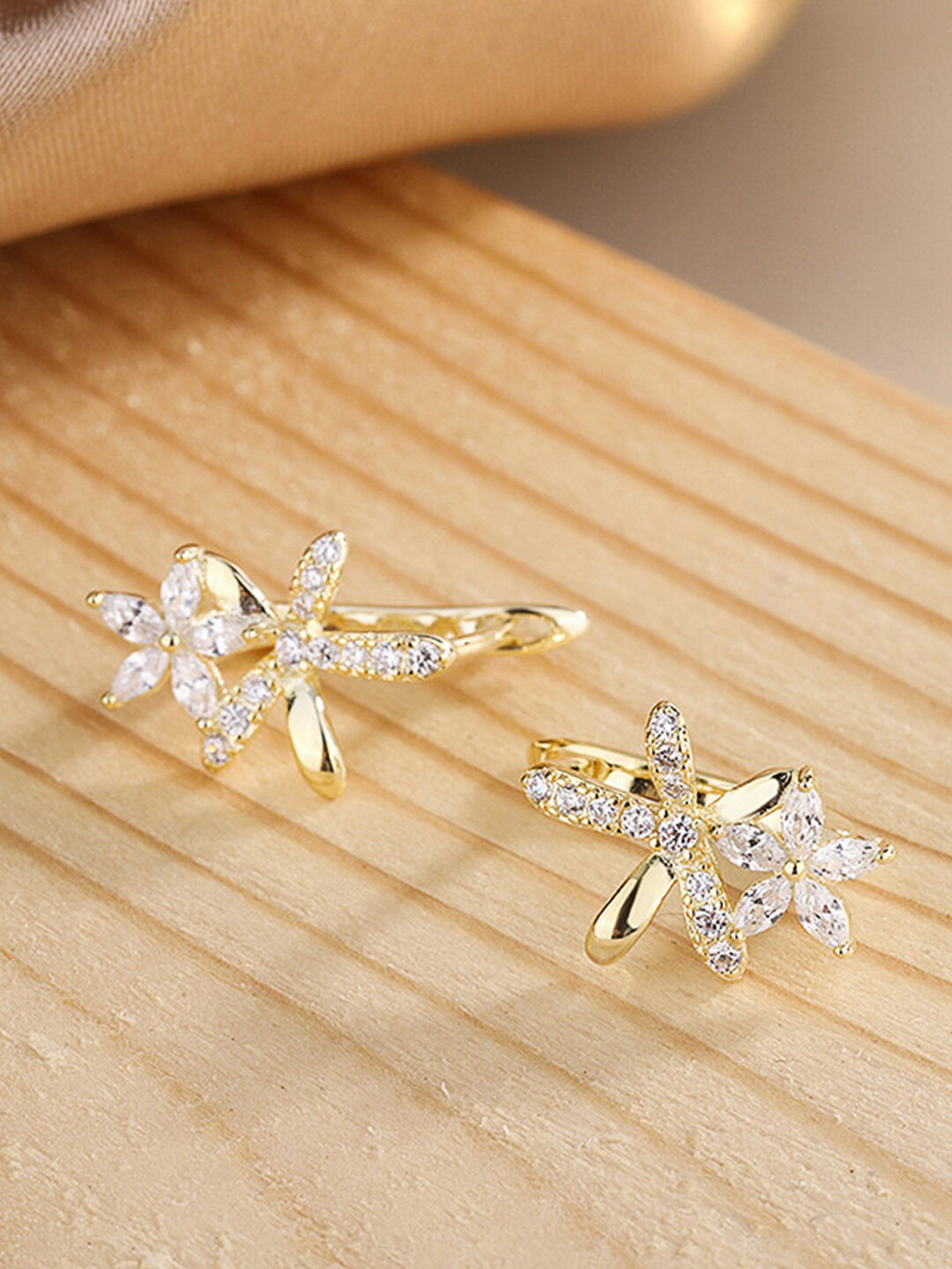 

Designs & You Gold-Toned Star Shaped Studs Earrings