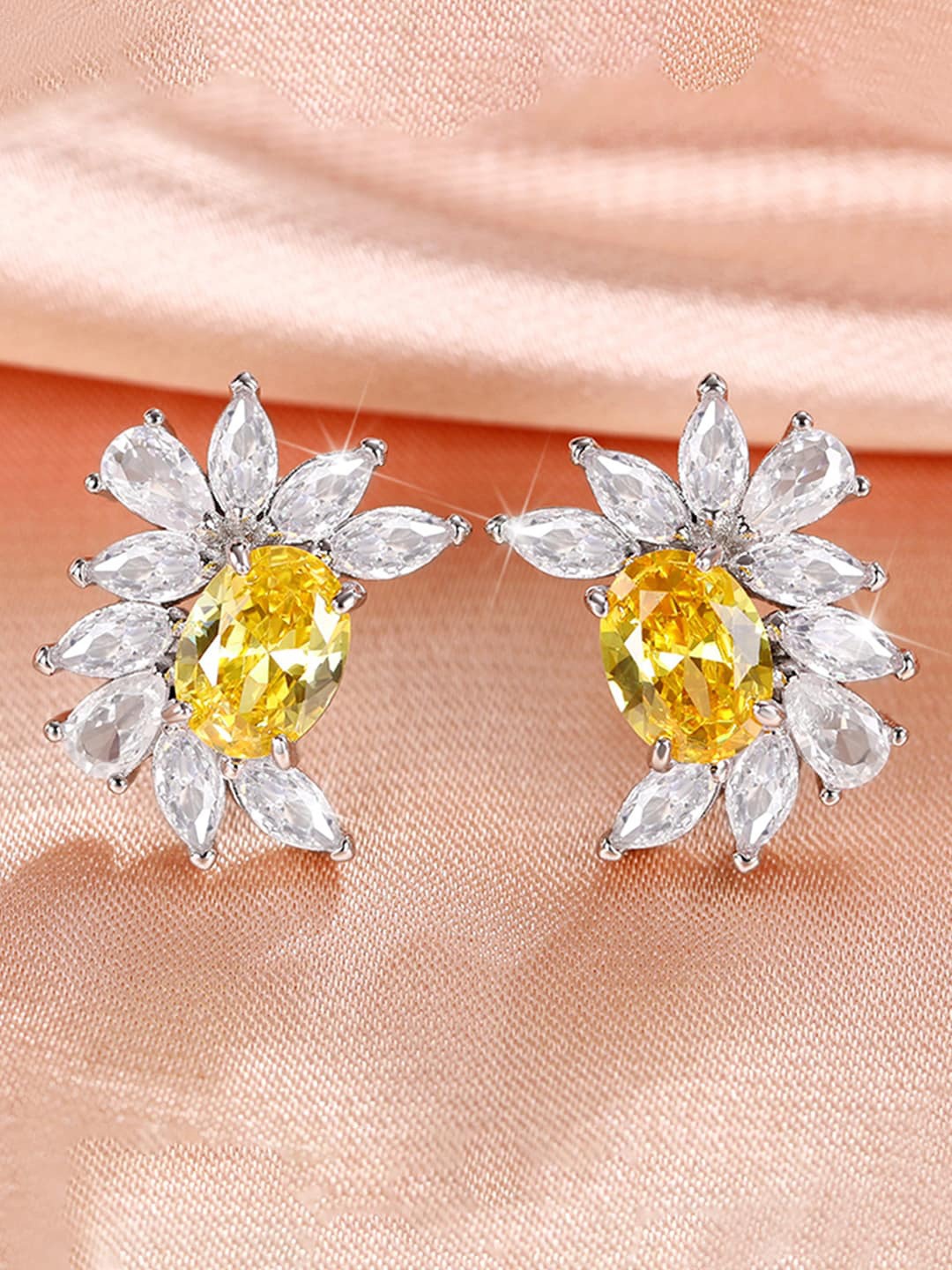 

Designs & You Silver Plated Studs Earrings