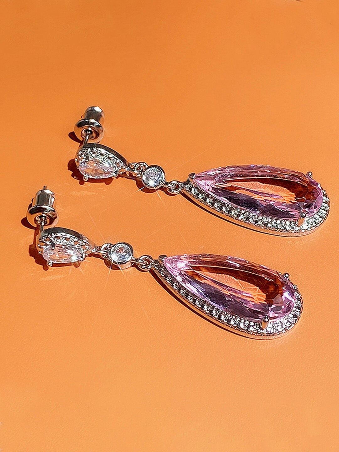 

Designs & You Silver-Plated Teardrop Shaped Drop Earrings