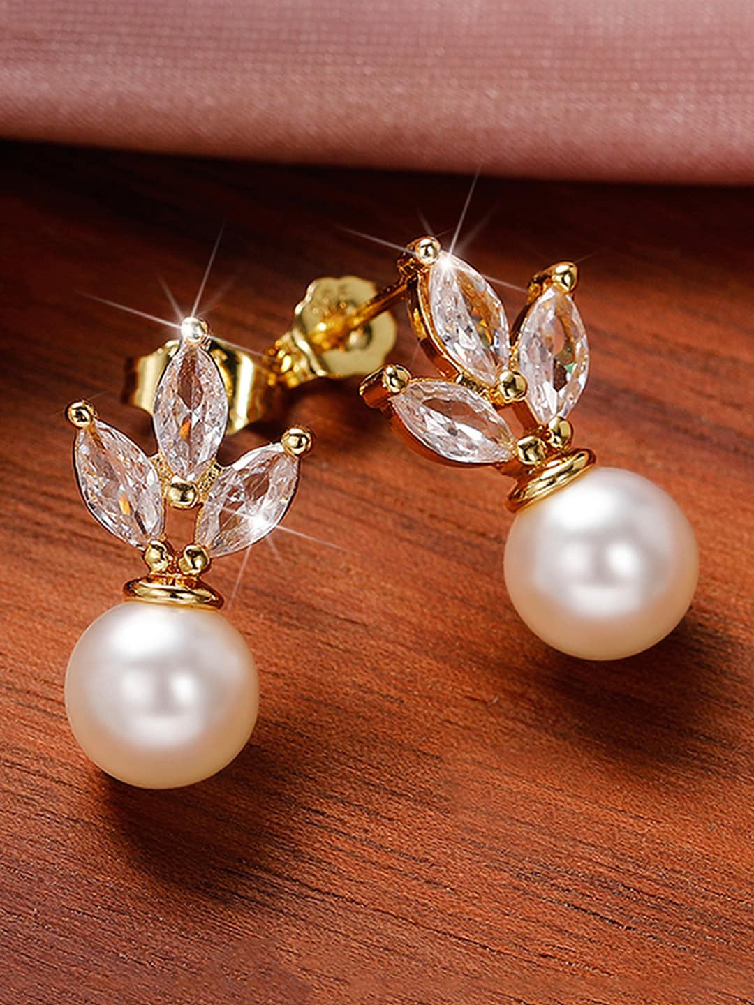 

Designs & You Gold Plated Contemporary Stud Earrings