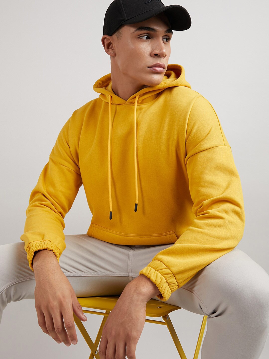 

Campus Sutra Hooded Pullover Cotton Sweatshirt, Yellow