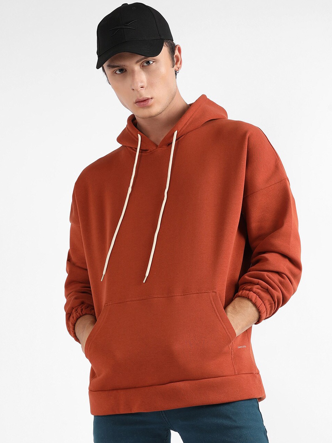 

Campus Sutra Hooded Pullover Drop Shoulder Sleeve Cotton Sweatshirt, Rust