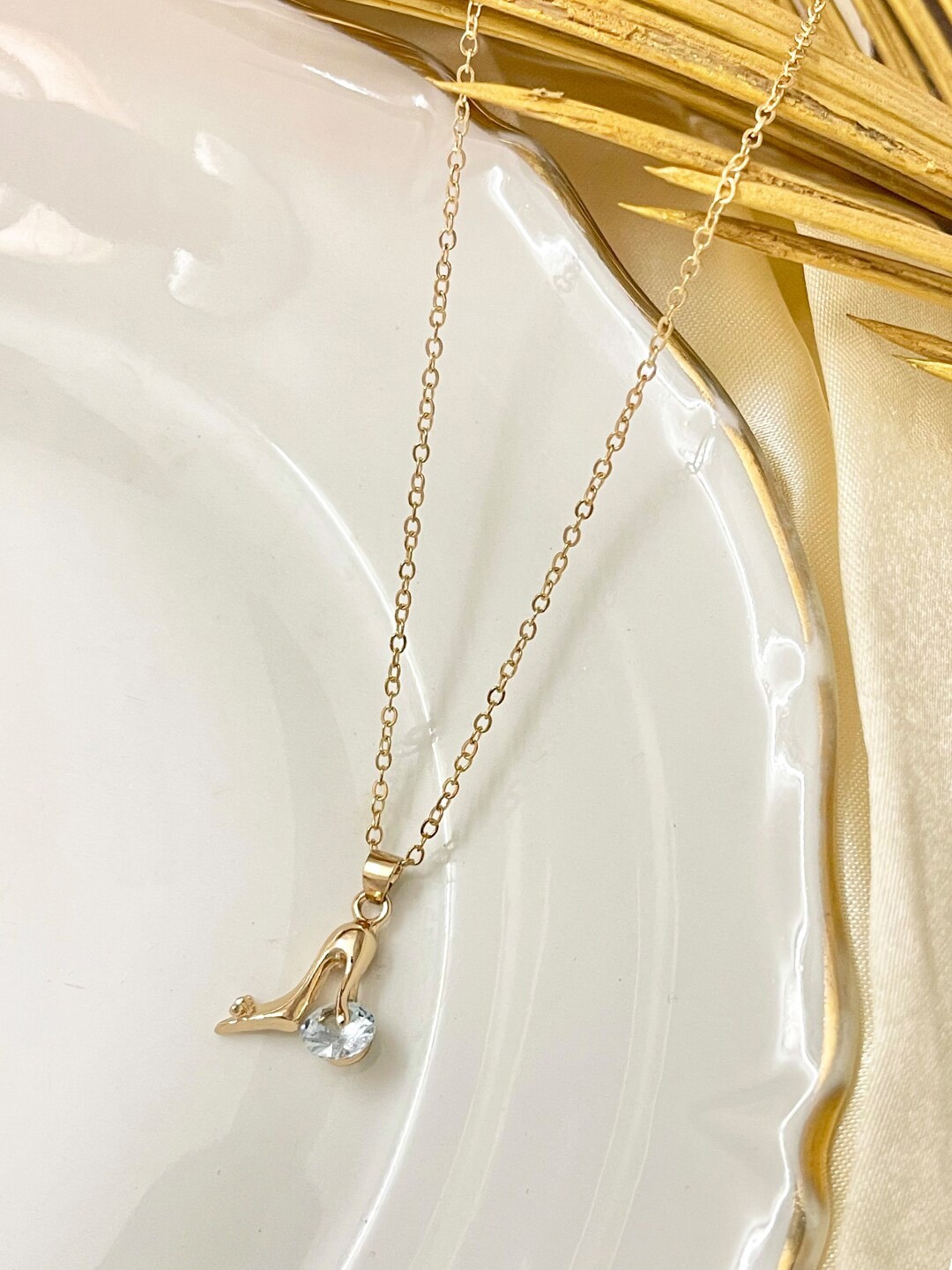 

Ayesha Stone Studded Stiletto Pendant With Chain, Gold