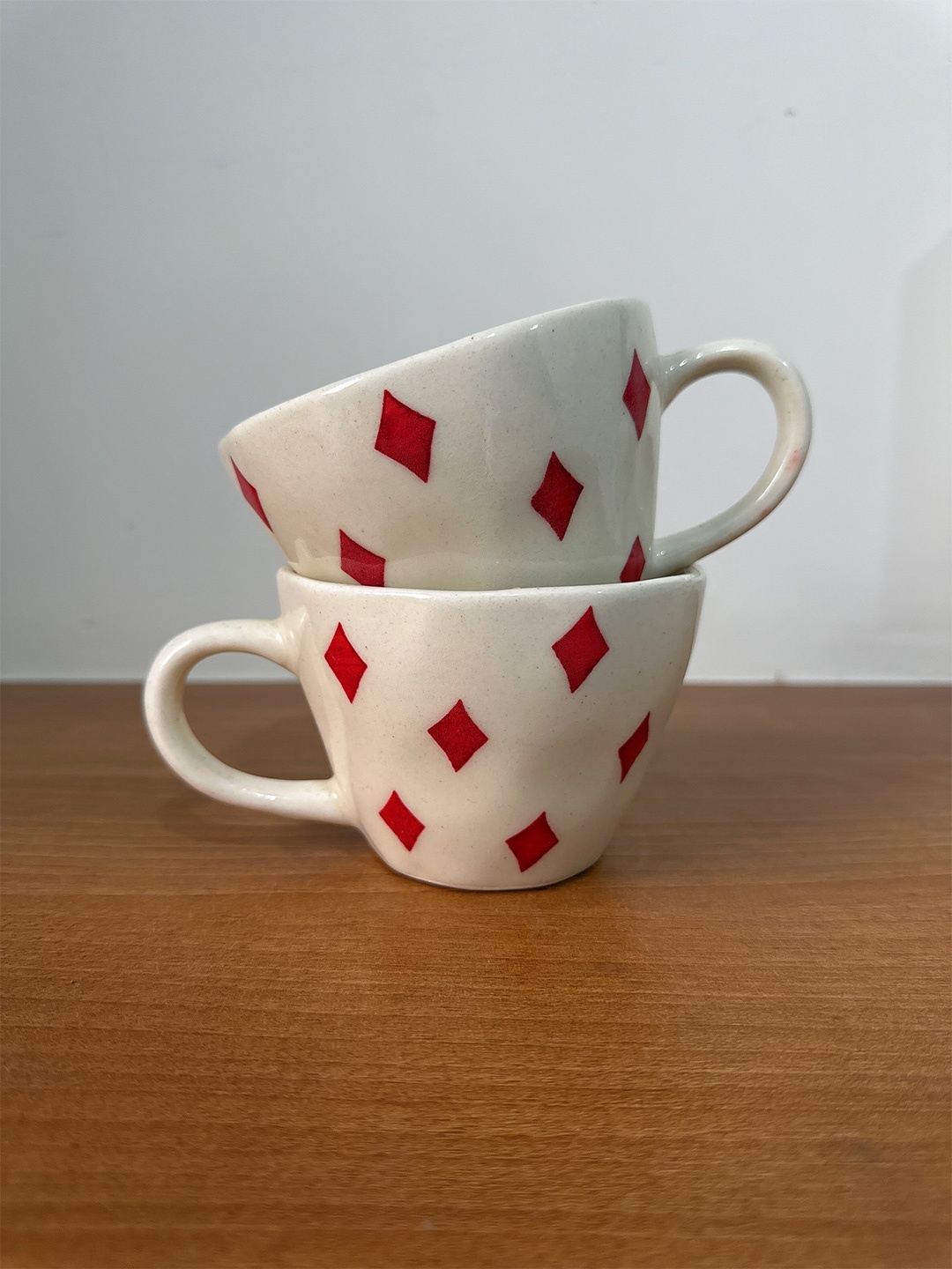 

CasaTrunk Cream-Coloured & Red 2 Pieces Printed Ceramic Glossy Cups 200 ml Each