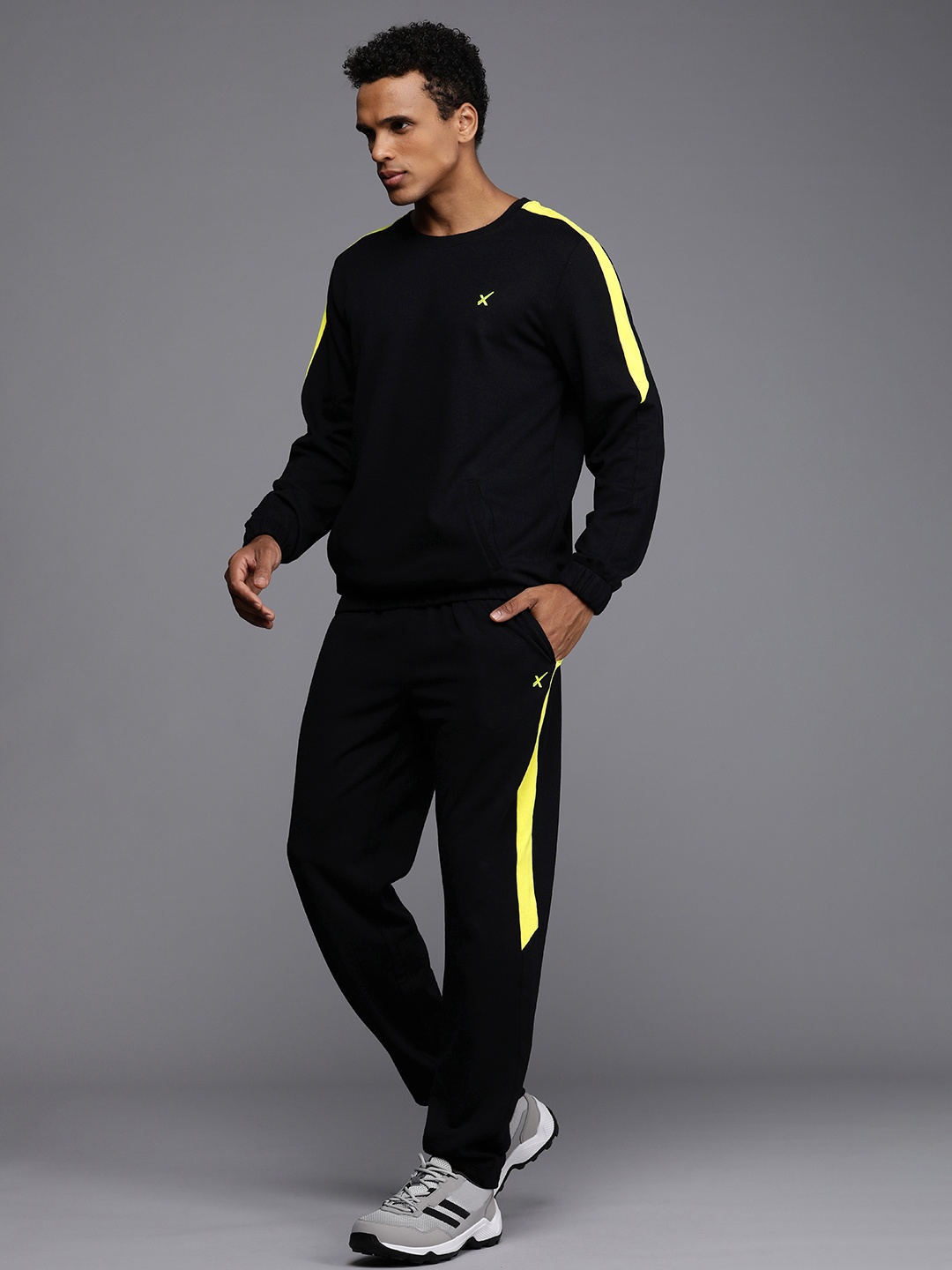 

HRX By Hrithik Roshan Men Side Striped Rapid-Dry Tracksuits, Black