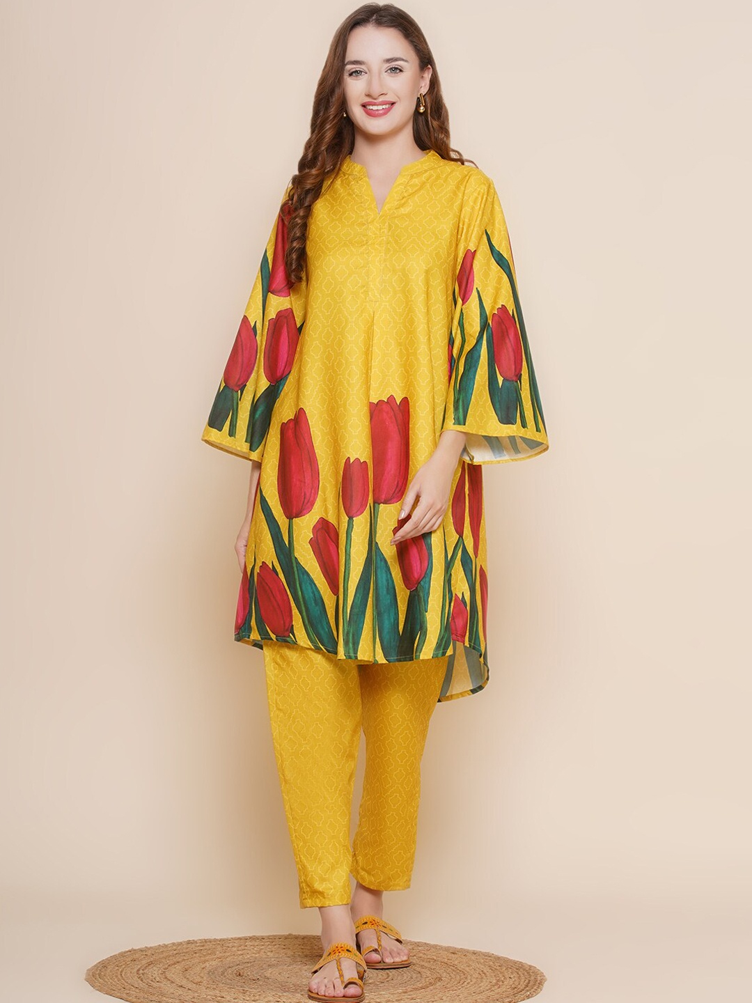 

Bhama Couture Floral Printed A-Line Kurta With Trousers, Mustard