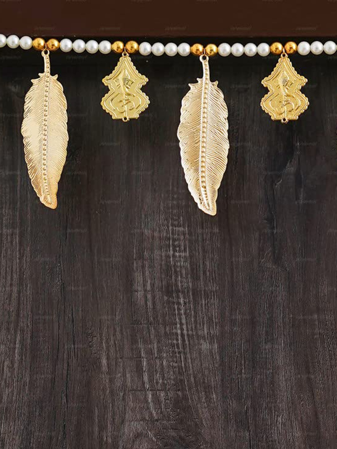 

Divyakosh Garlands Gold Toned & White Leaf and Kalash Bandarwal Toran Wall Decor