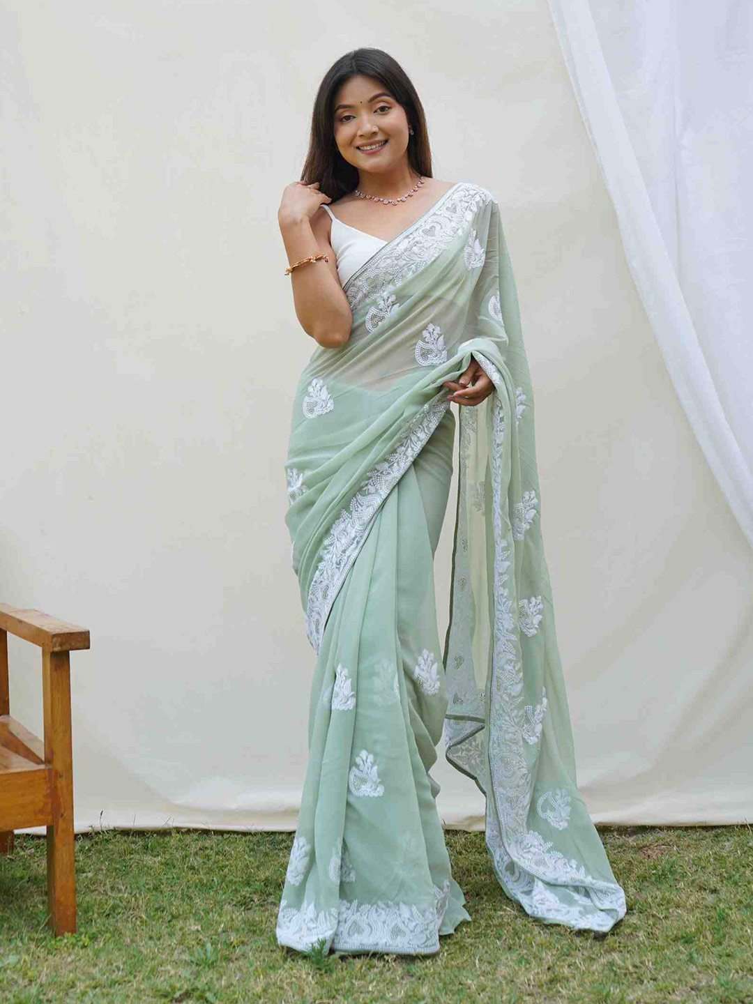 

Mitera Embellished Embroidered Pure Georgette Saree, Teal